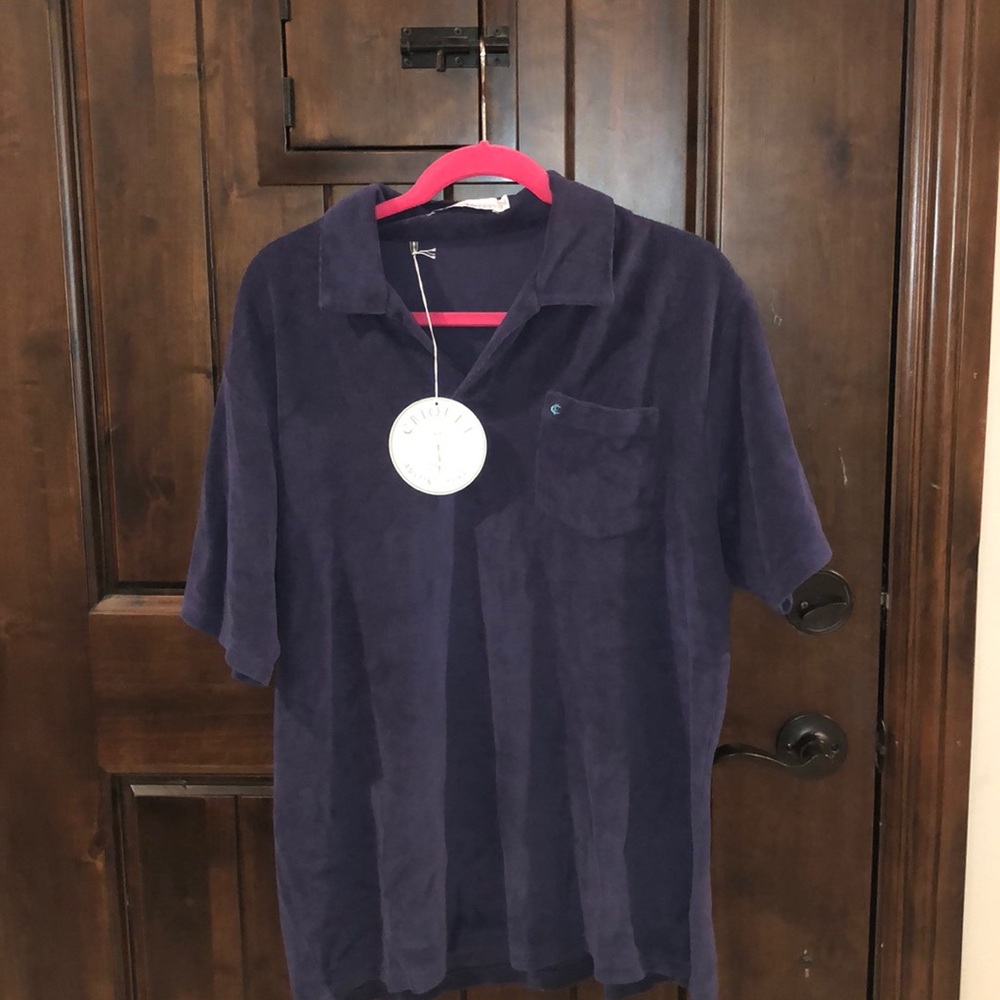 Blue terry cloth short sleeved collared shirt